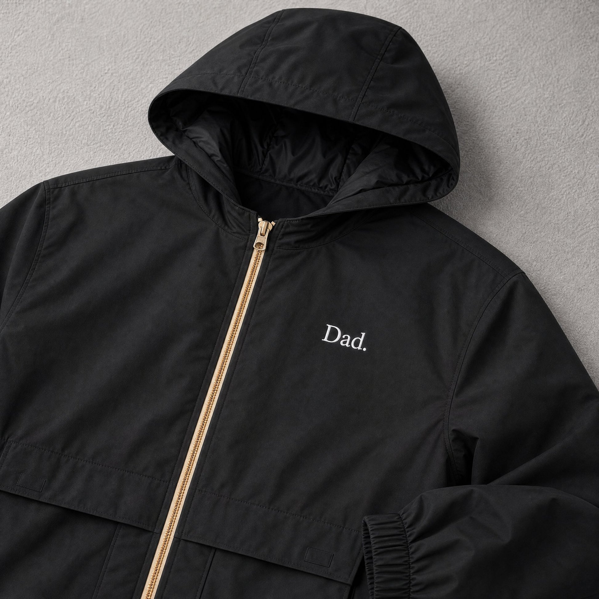 "Dad." Vintage Rain Jacket in Black — Flat Lay | Merchcraft