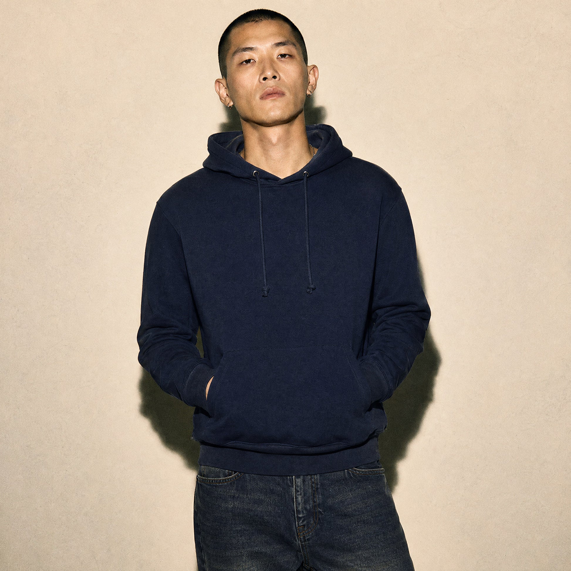 Custom Fleece Hoodie Sweater – Model Photo | Merchcraft